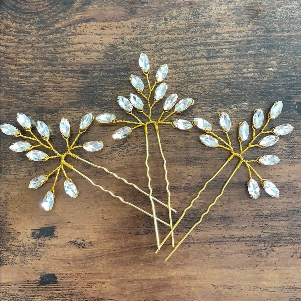 Set of three gold crystal wedding hair pins
